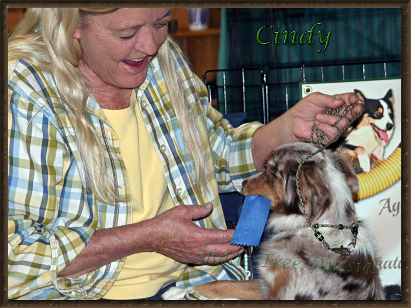 Cindy handing me her first place conformation ribbon. Cindy handing me her first place conformation ribbon.