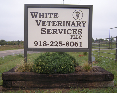 White Veterinary Services sign.